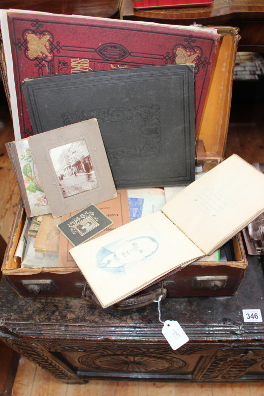 Case of ephemera including 19th Century albumen photographs of Mounsey Family (northeast interest), antique UK atlas by Lewis & Co, c1920s sketchbook with drawings and poetry, cdv photo album, postcards, booklets, etc.