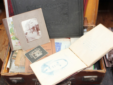 Case of ephemera including 19th Century albumen photographs of Mounsey Family (northeast interest), antique UK atlas by Lewis & Co, c1920s sketchbook with drawings and poetry, cdv photo album, postcards, booklets, etc. thumbnail