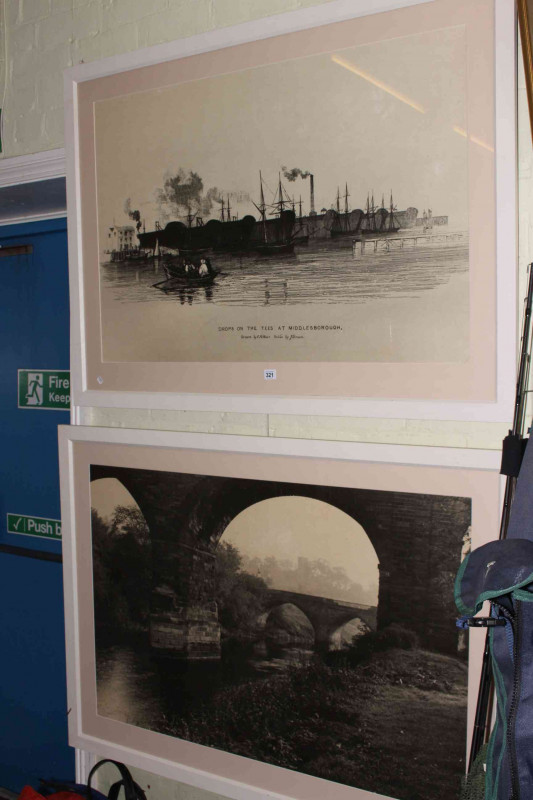 Large framed print 'Drops on the Tees at Middlesbrough' and large framed photographic print of bridges over a river.
