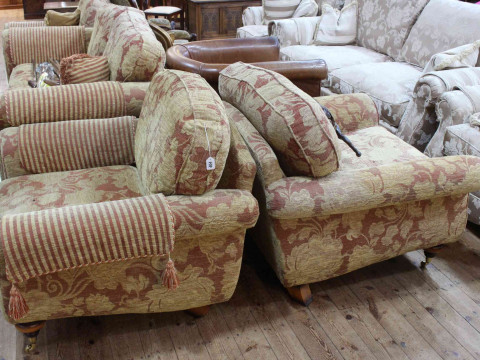 Four piece lounge suite comprising large two seater settee and three armchairs in floral pattern fabric. thumbnail
