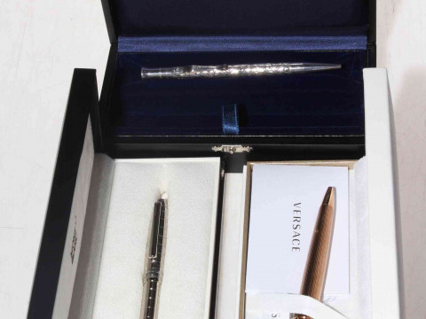 Three boxed pens, silver Yard-o-led, Mont Blanc and Versace.