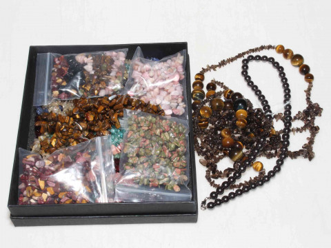 Necklaces and stones including Tigers Eye.