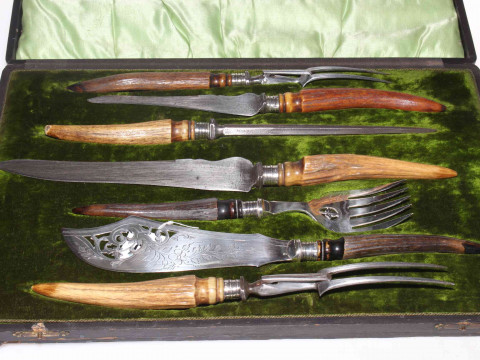 Cased silver mounted horn handled carver set with steel and fish servers,...