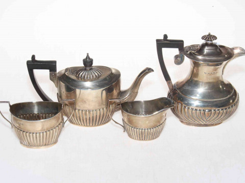 Silver three piece part fluted tea set, London 1902 and Birmingham 1900,...