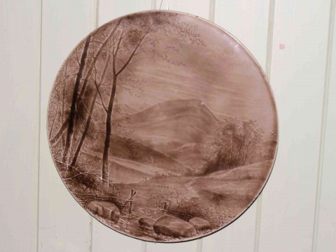 Burmantofts Lakeland landscape plaque, 45cm diameter.