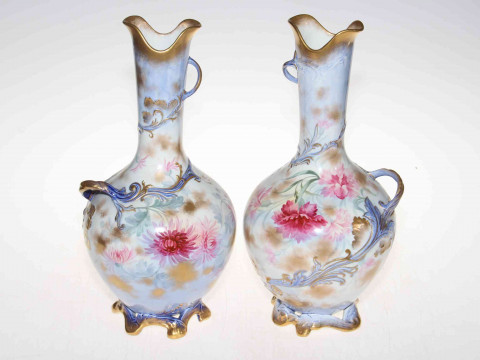 Pair George Jones flower decorated vases, 33cm.