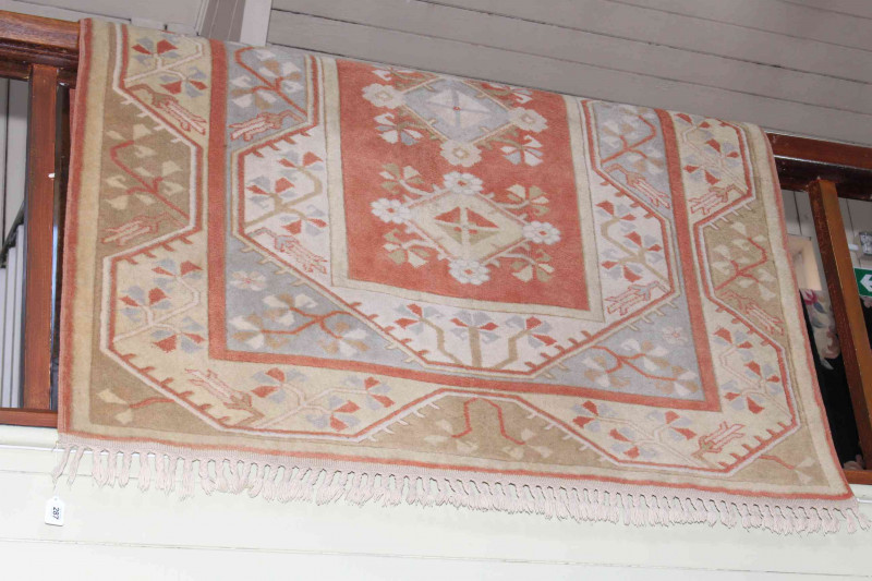 Wool Geometrical and floral design rug 2.30 by 1.55.