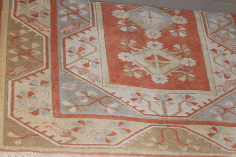 Wool Geometrical and floral design rug 2.30 by 1.55.
