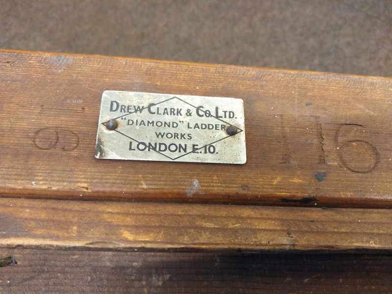 Vintage wooden extending ladder, labelled Drew Clark & Co Ltd Diamond Ladder Works.