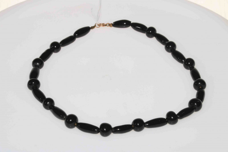 Jet bead necklace with gold clasp, 44cm length.