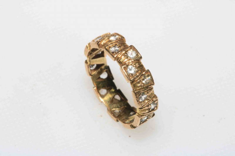 9 carat gold white stone eternity ring, size O.