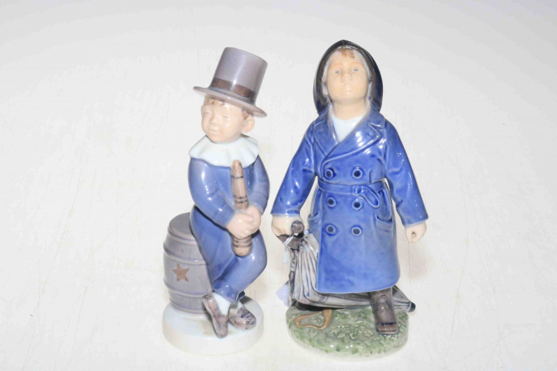 Two Royal Copenhagen figures, boy juggler 4524, and boy with umbrella 3556, 18cm.