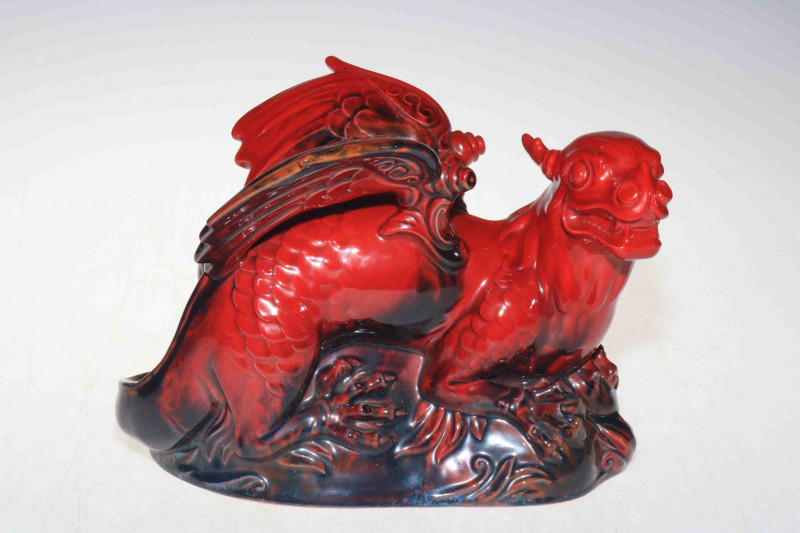 Royal Doulton Flambé veined dragon, initialled AM to base, 26cm across, 18cm high.