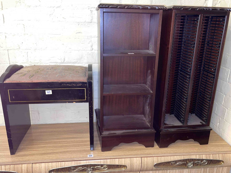 Pair revolving CD and book towers and ebonised piano stool (3).