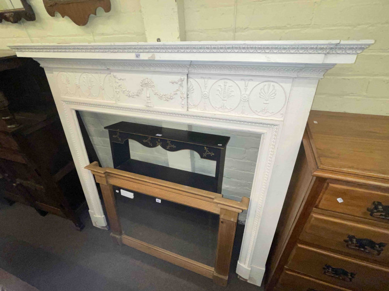 Painted fire surround, pine framed overmantel mirror and painted two drawer open wall rack (3).