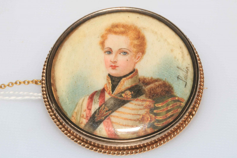 Signed Paulin portrait miniature of young military figure, 14k gold brooch mount with rope twist border, 4.5cm diameter.