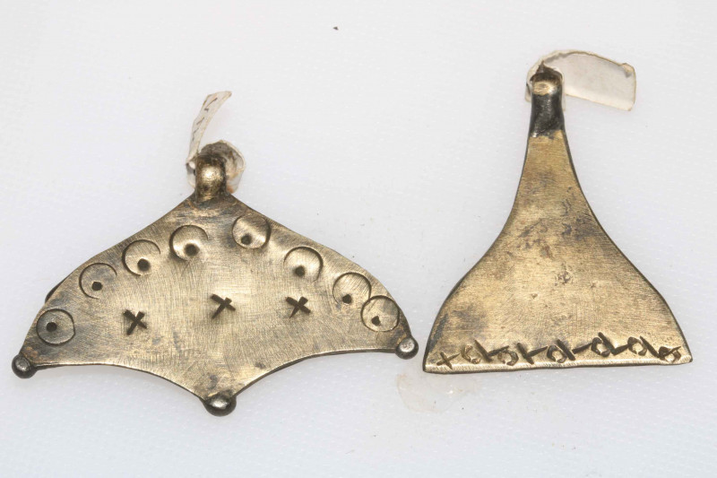 Two Lunula pendants,possibly Viking.