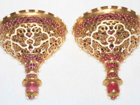 Pair Zsolnay pierced wall brackets, 13.5cm high.
