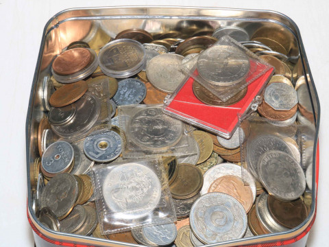 Box of coins and tokens.