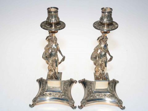 Good quality pair of silver plated figure candlesticks, featuring maiden...
