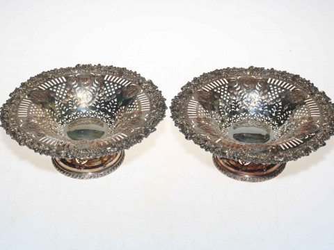 Pair silver on copper tazza with pierced and raised decoration, 24cm diameter.