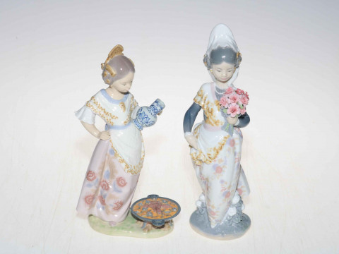 Two Lladro figures, Valencian Girl with Flowers, 1304, 24.5cm, and Woman...