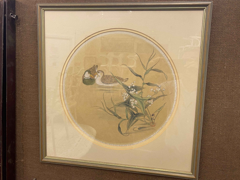 Three Chinese circular woodcut prints of ducks, birds and foliage, largest 50cm square.