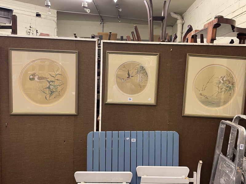 Three Chinese circular woodcut prints of ducks, birds and foliage, largest 50cm square.