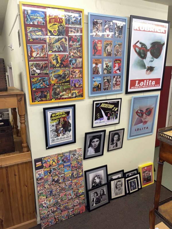 Large collection of framed cinema/theatre/political interest inc signed clippings (Enoch Powell, P. J. Proby), Ronald Reagan quote, Lolita, etc.
