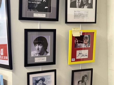 Large collection of framed cinema/theatre/political interest inc signed clippings (Enoch Powell, P. J. Proby), Ronald Reagan quote, Lolita, etc. thumbnail