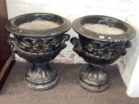 Pair of black painted garden Campana style garden urns decorated with...