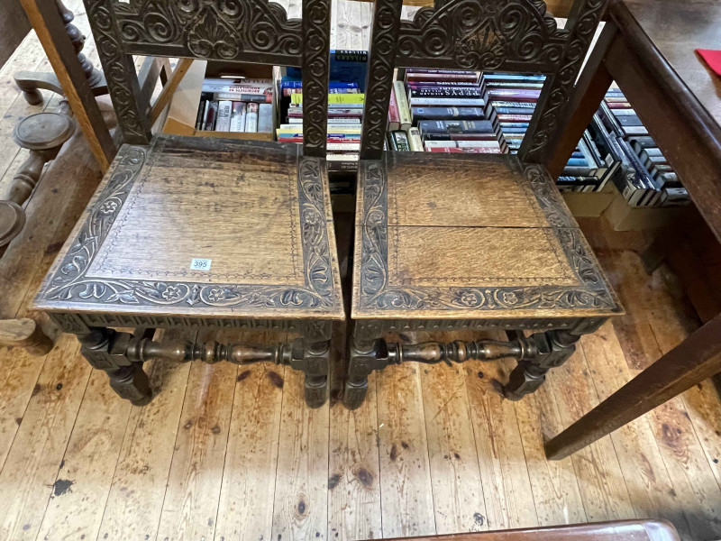 Pair Victorian carved oak hall chairs.