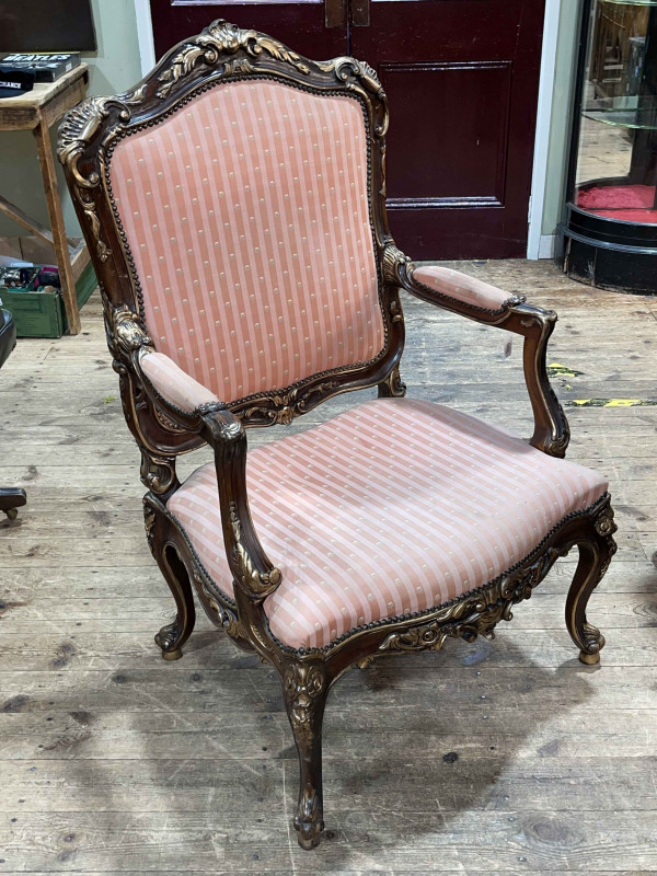 French part gilt painted fauteuil with serpentine front seat.