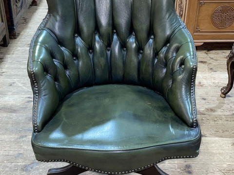 Green deep buttoned and studded leather swivel office chair. thumbnail