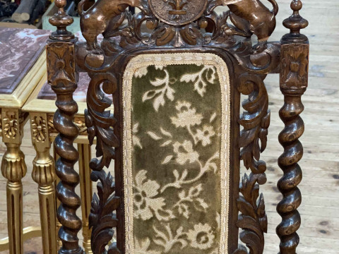 Pair Victorian carved oak side chairs with armorial crests. thumbnail