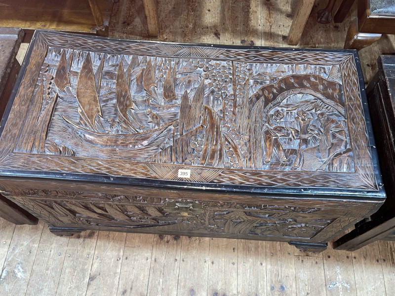 Eastern carved camphorwood trunk, 61cm by 103cm by 51cm.