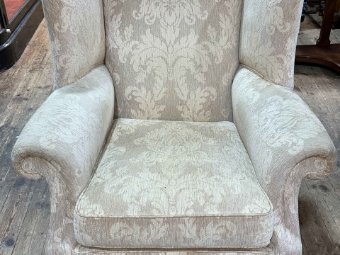 Wing armchair on ball and claw legs in light classical fabric. thumbnail