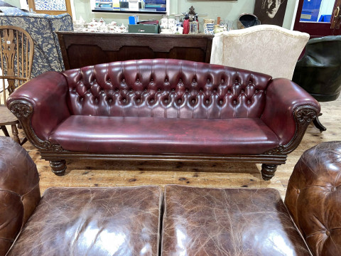 Victorian mahogany framed settee in deep buttoned ox blood leather. thumbnail