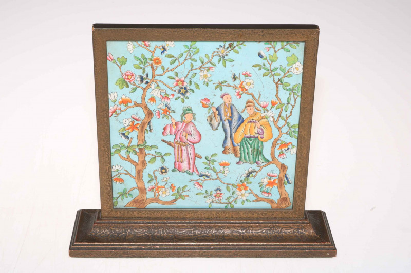 19th Century Chinese enamel decorated tile table screen, with figures in a floral garden decoration.