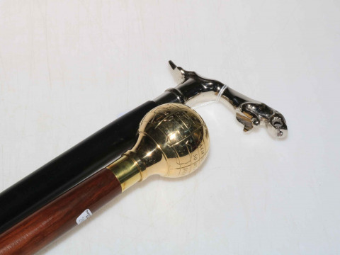 Jaguar handled walking stick and globe mounted walking stick. thumbnail