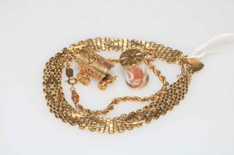 9 carat gold chain bracelet, 9 carat gold rope twist bracelet, and two charms.