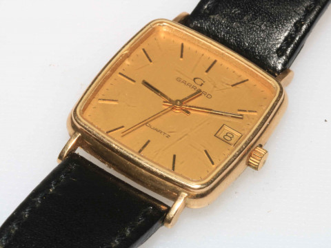Gents 9 carat gold Garrard watch with box and papers. thumbnail
