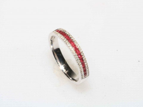 Ruby, diamond and 18 carat white gold ring, size N.
