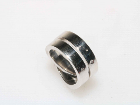 Cartier 18 carat white gold ring of entwined/knot form, marked c1999 Cartier J00459, size G, in original case and outer box. thumbnail