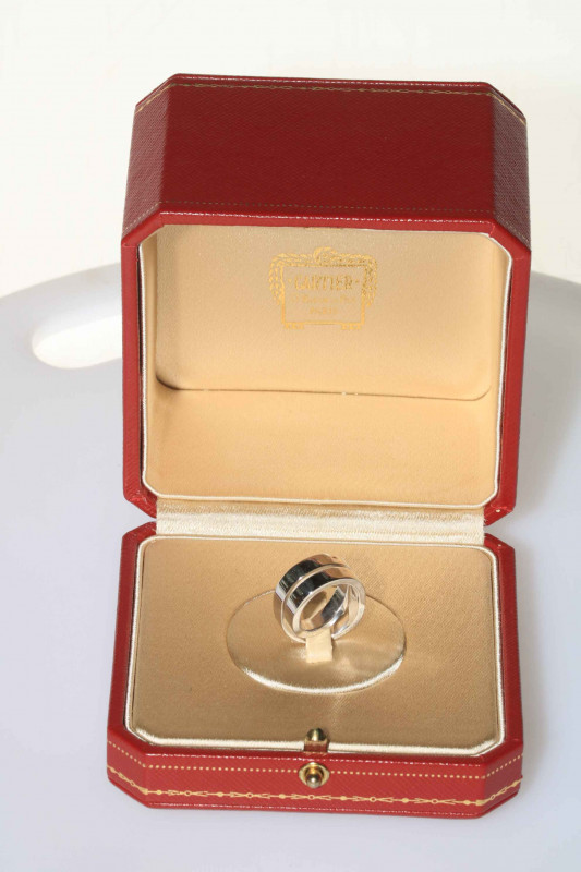 Cartier 18 carat white gold ring of entwined/knot form, marked c1999 Cartier J00459, size G, in original case and outer box.