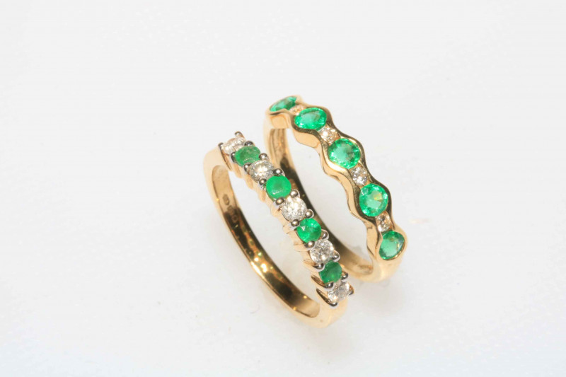 Two emerald and diamond 18 carat yellow gold rings.