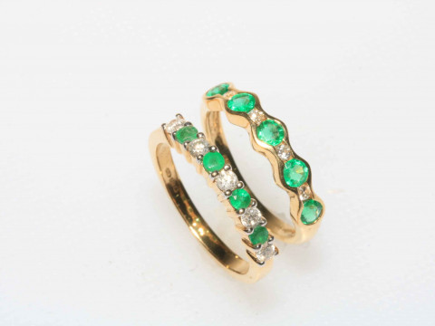 Two emerald and diamond 18 carat yellow gold rings.