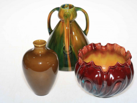 Bretby jardiniere, Burmantofts vase and similar three handled vase.