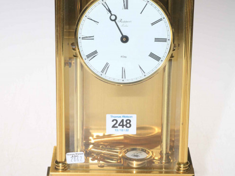 Rapport of London brass and glass mantel clock with enamel dial.