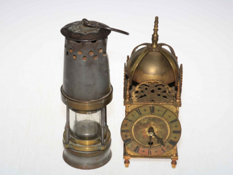 John Davis & Sons miners lamp and ornate brass lantern clock.